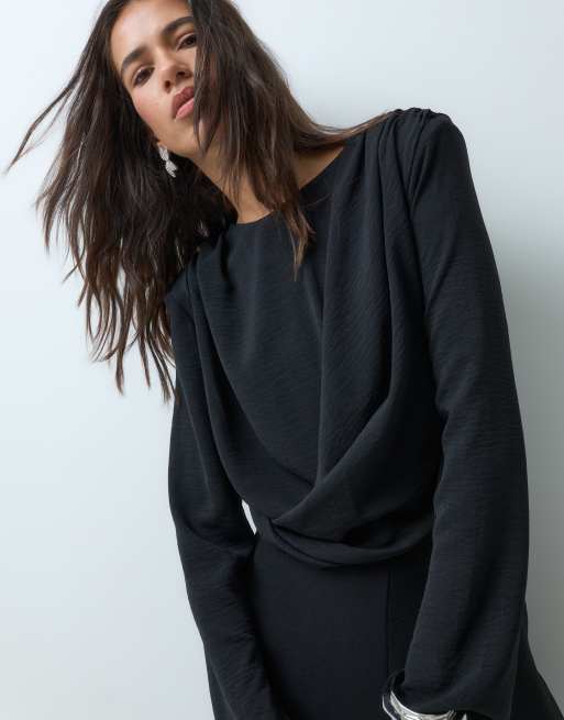 ASOS DESIGN shoulder pad long sleeve jumpsuit with ruched bodice and twist detail in black, 2 of 5