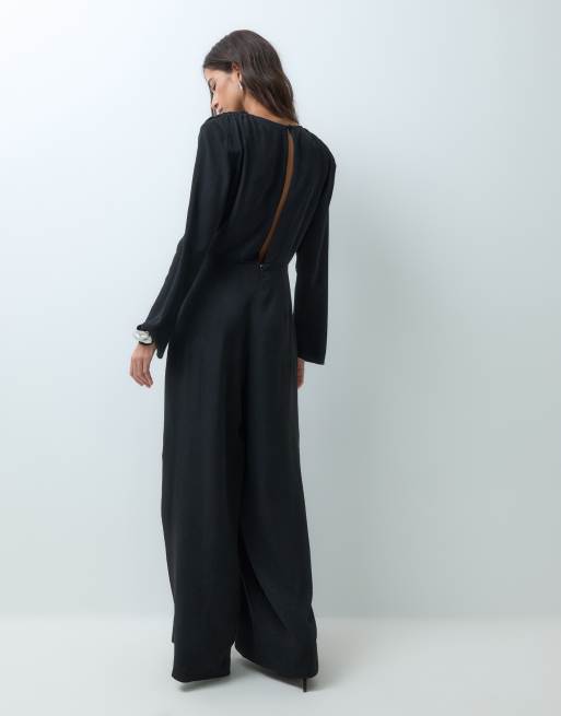 ASOS DESIGN shoulder pad long sleeve jumpsuit with ruched bodice and twist detail in black, 3 of 5