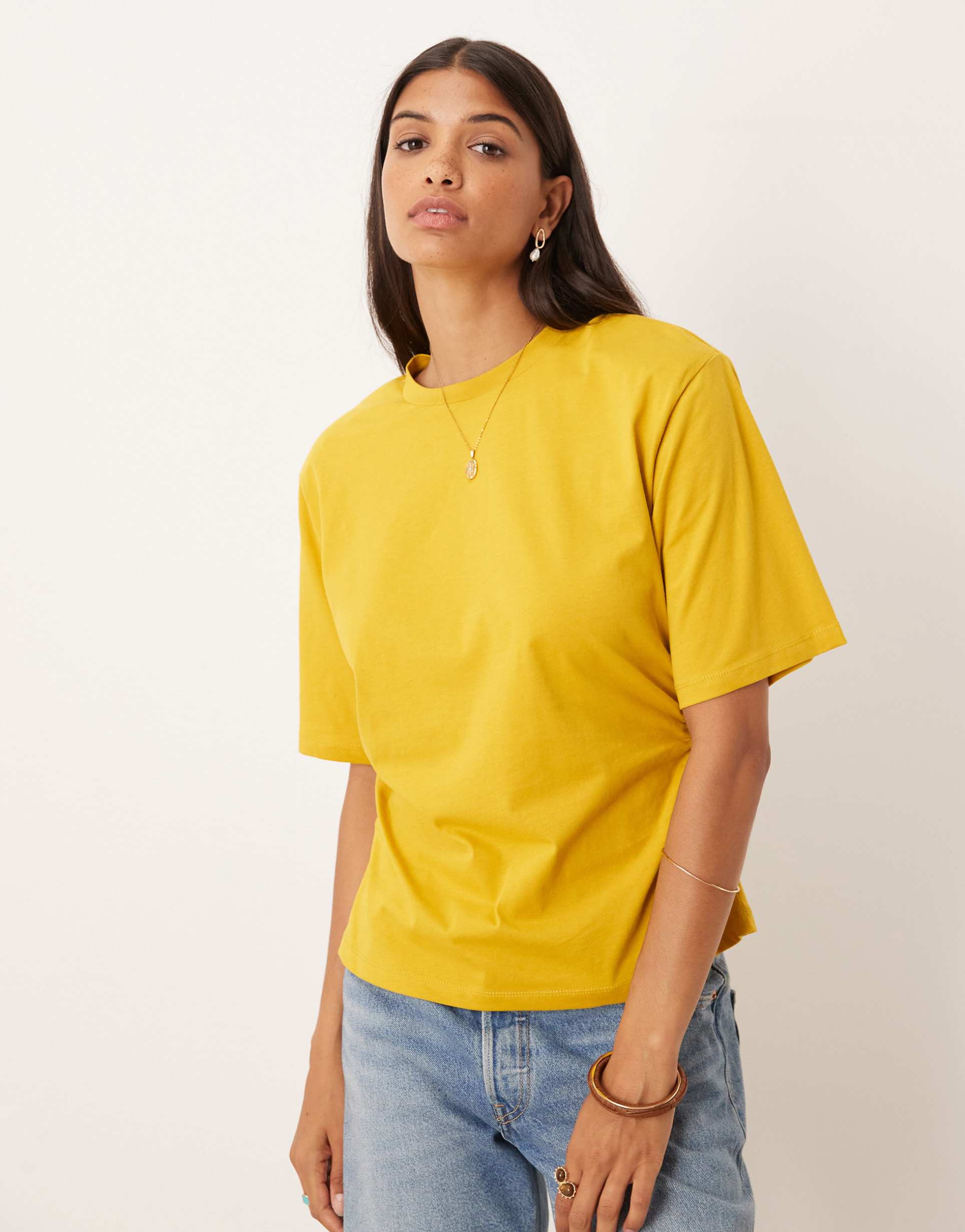 asos design shoulder pads cinched tee in ocher
