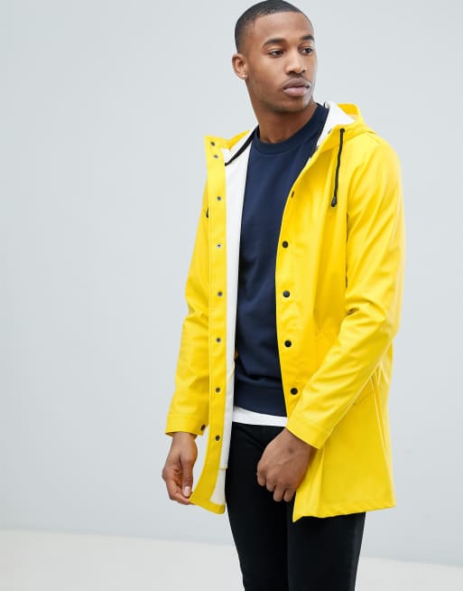 ASOS DESIGN shower resistant rain coat in yellow