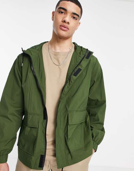 ASOS DESIGN shower resistant rain jacket in green | ASOS