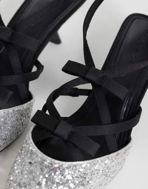 ASOS DESIGN Showgirl strappy bow mid heels in silver and black, 3 of 4