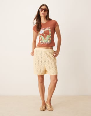 Asos Design Shrunken Baby Tee With Floral Tile Graphic In Brown