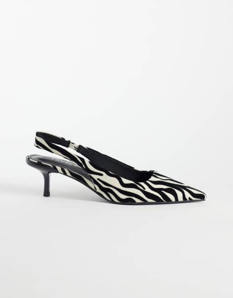 ASOS DESIGN Signature kitten heeled shoes in zebra - view 1