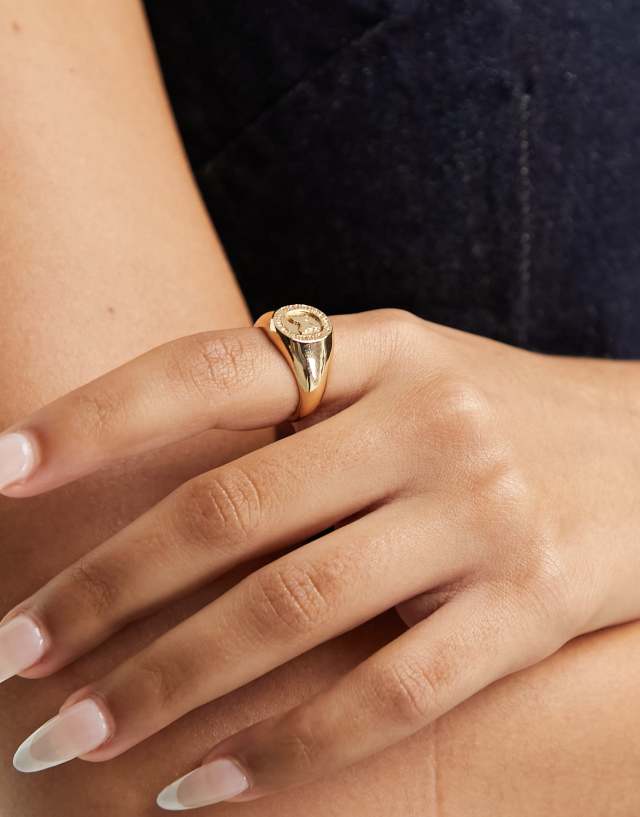 ASOS DESIGN signet ring with butterfly embossed motif in gold tone