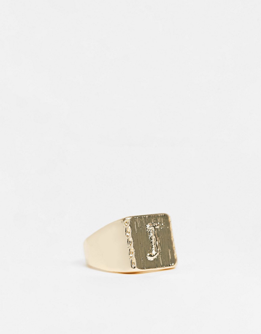 ASOS DESIGN signet ring with J letter design in shiny gold tone