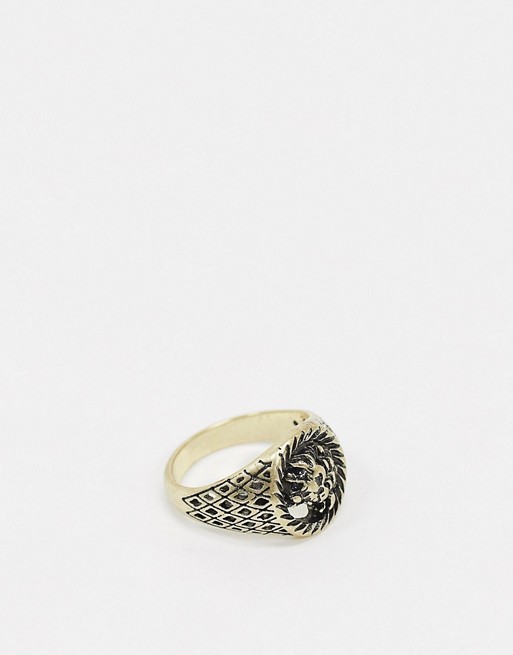 ASOS DESIGN signet ring with sovereign lion detail in burnished gold tone
