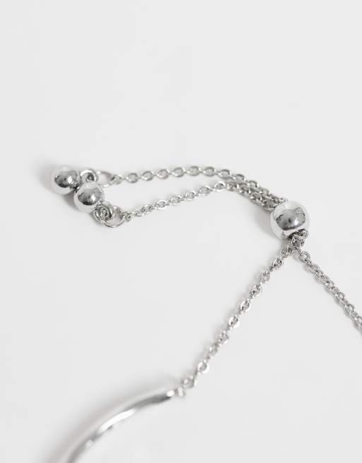 ASOS DESIGN – Silberfarbene Armbänder im 2er-Pack mit einfachem Knebeldetail, 2 von 3