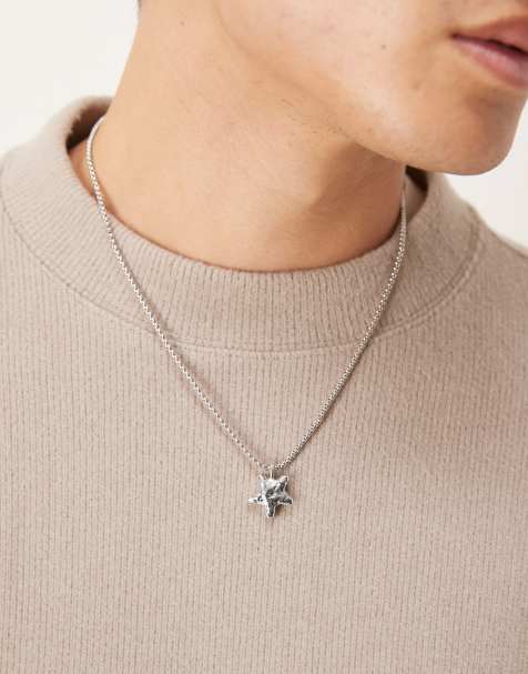 ASOS DESIGN – Silberfarbene Halskette mit bauschigem Sternenanhänger in gehämmerter Optik - view 1