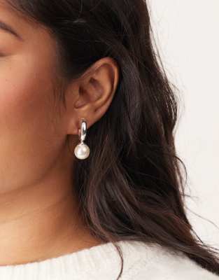 ASOS DESIGN silver plated drop hoop earrings with faux pearl detail