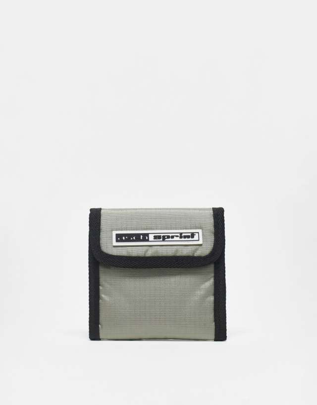 ASOS DESIGN skate style wallet in textured gray with badge