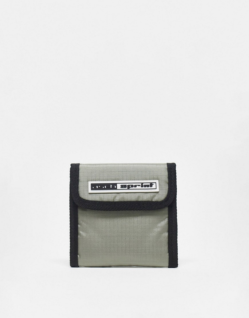 ASOS DESIGN skate style wallet in textured grey with badge
