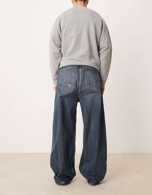 ASOS DESIGN skater fit jeans in dark wash blue with rips, 3 of 5