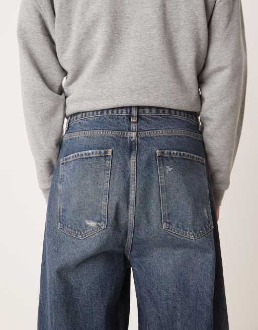 ASOS DESIGN skater fit jeans in dark wash blue with rips, 4 of 5