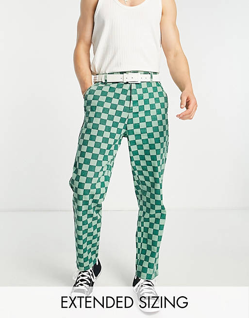 ASOS DESIGN skater fit pants with checkerboard print in green