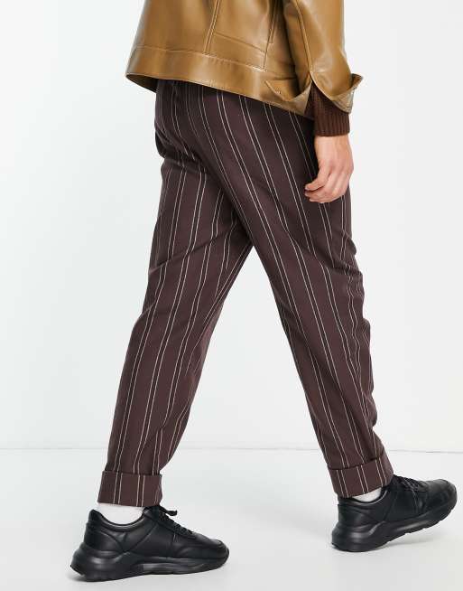 ASOS DESIGN skater fit pants with deep turn up in brown stripe