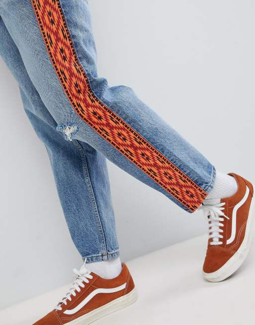Orange side stripe deals jeans