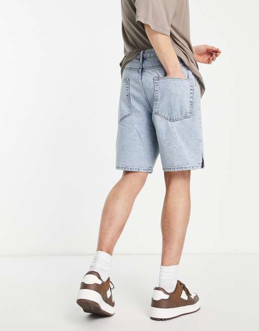 ASOS DESIGN - Skatershorts i denim med syrevask og slids i sømmen 