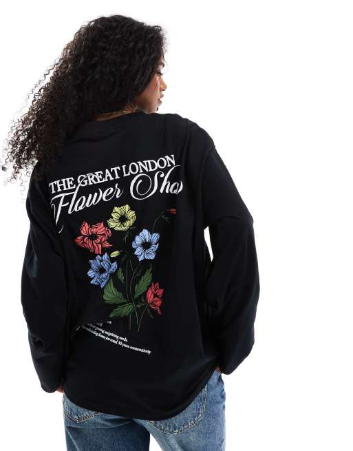 ASOS DESIGN - Skatertop met lange mouwen en grafische bloemprint op de achterkant in zwart