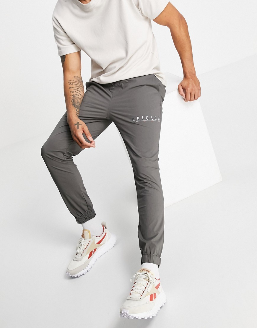 ASOS DESIGN skinny ankle grazer pants with city print-Grey