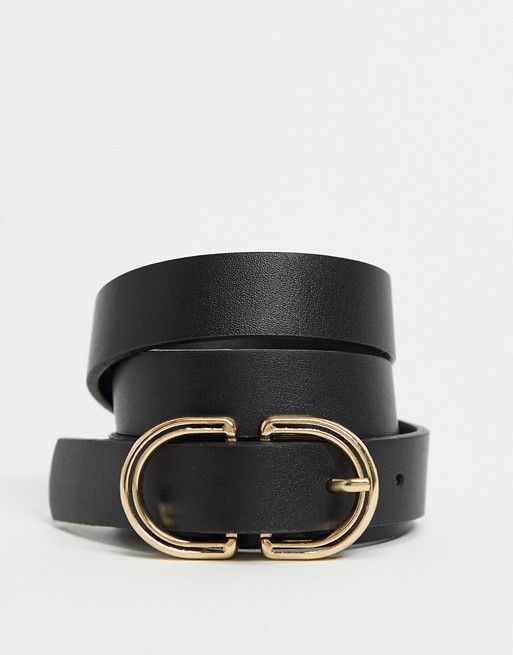 ASOS DESIGN skinny belt in black faux leather with round gold buckle - BLACK