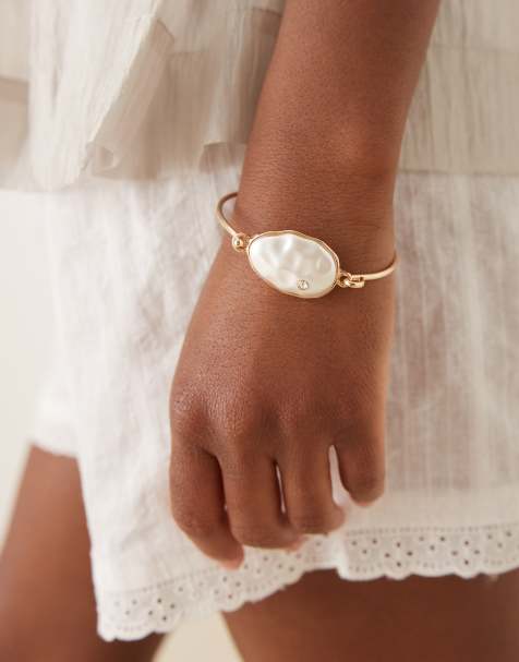 ASOS DESIGN skinny bracelet with faux semi precious stone and crystal in gold tone - view 1