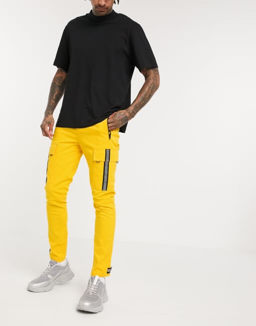 ASOS DESIGN skinny cargo pants in yellow with reflective tape