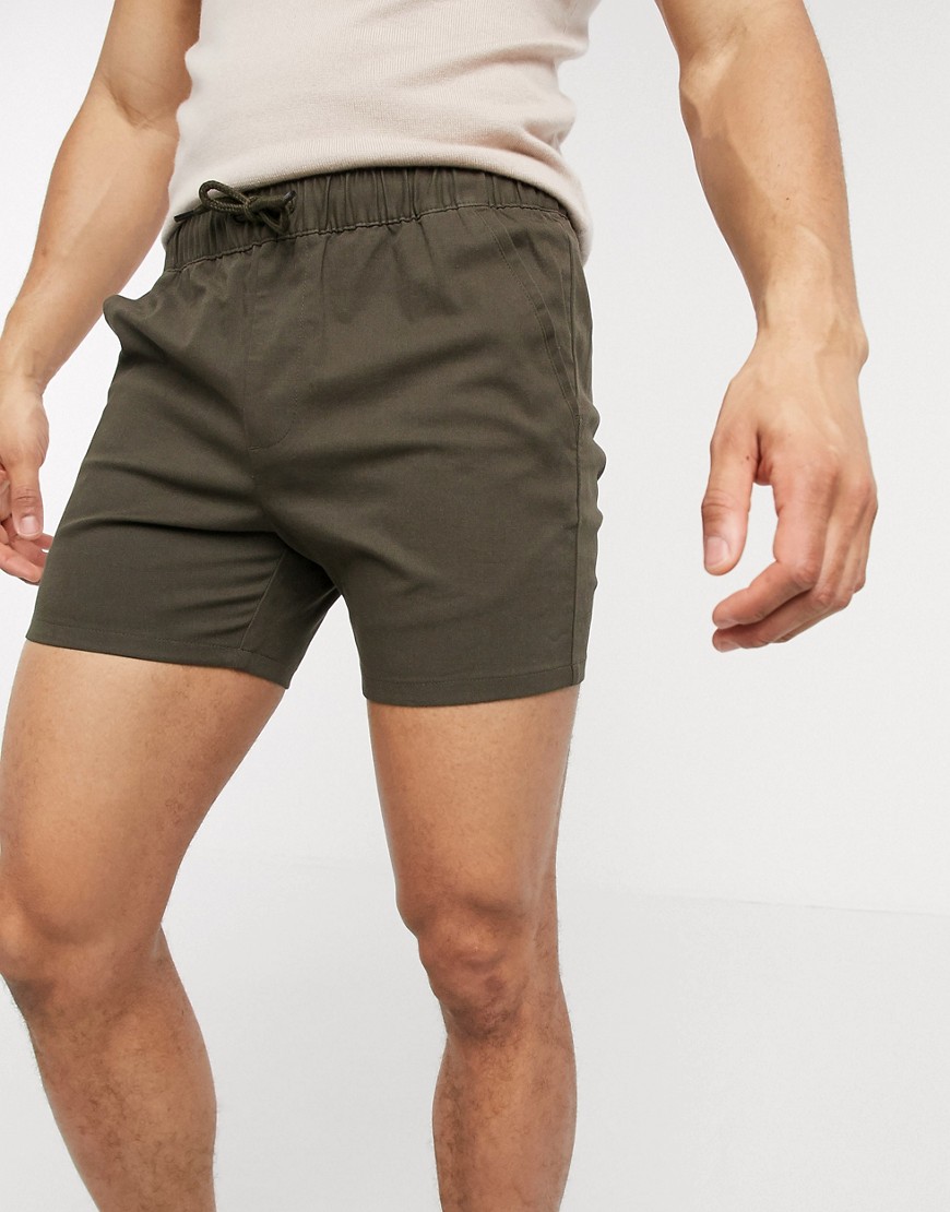 ASOS DESIGN skinny chino shorter shorts with elastic waist in dark khaki-Green