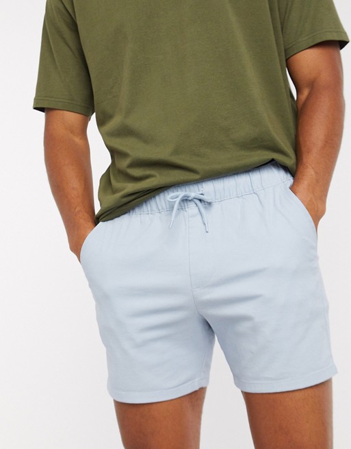 ASOS DESIGN skinny chino shorter shorts with elastic waist in pastel blue