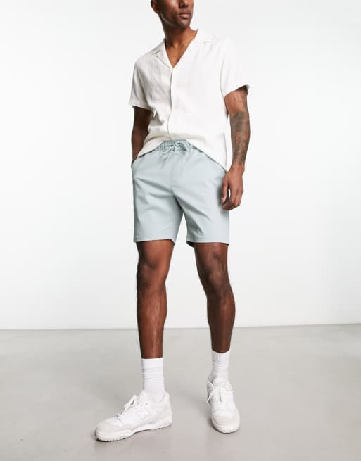 ASOS DESIGN skinny chino shorts in mid length in blue 