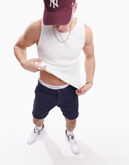 ASOS DESIGN skinny chino shorts in mid length in navy , 3 of 4