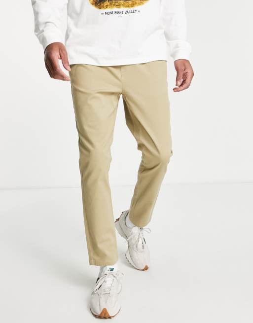 ASOS DESIGN skinny chinos with elastic waist in mid beige, 4 of 4
