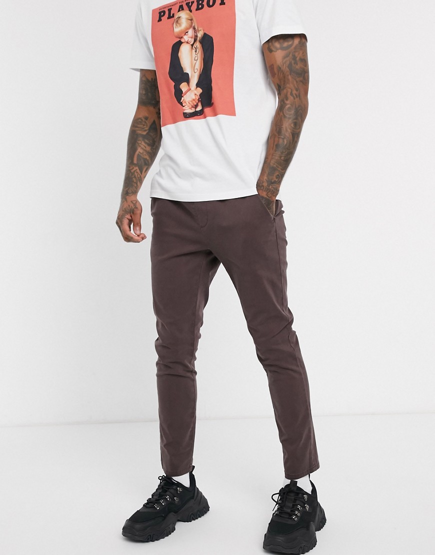 ASOS DESIGN skinny chinos with elastic waist in washed brown