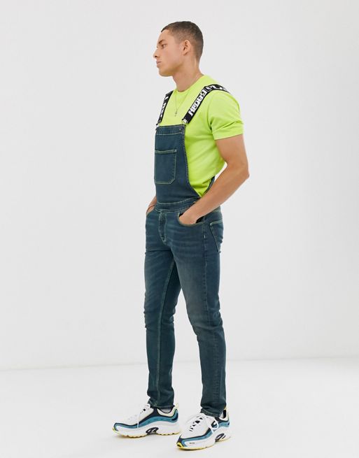 ASOS DESIGN skinny denim overalls with neon stitch and printed