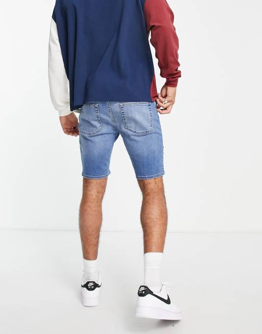 ASOS DESIGN - Skinny denim short met normale lengte en scheuren in middenblauwe wassing , 4 van 4