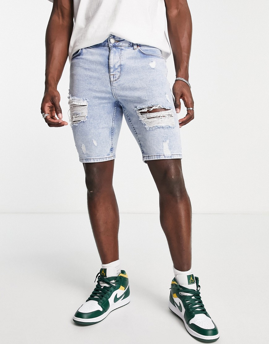 ASOS DESIGN skinny denim shorts in light wash with heavy rips-Blue