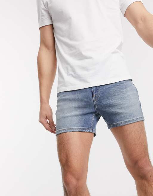 ASOS DESIGN skinny denim shorts in mid wash blue in shorter length