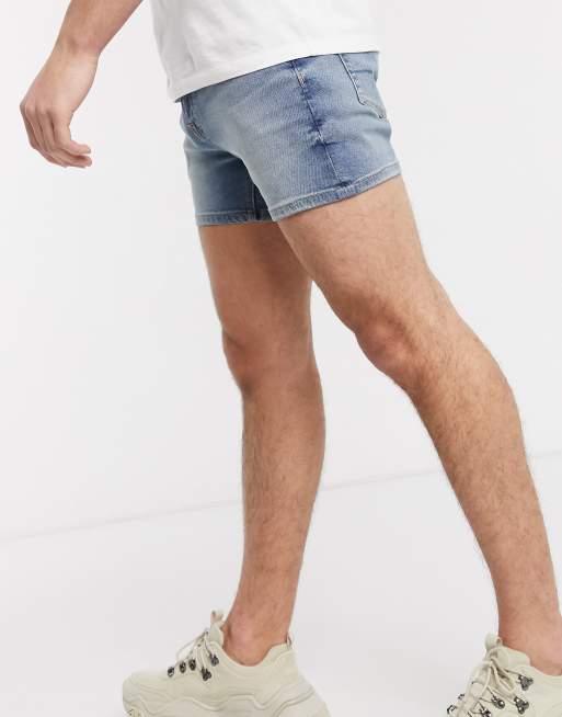 ASOS DESIGN skinny denim shorts in mid wash blue in shorter length