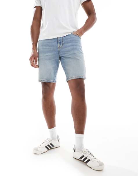 ASOS DESIGN skinny denim shorts in mid wash blue - view 1