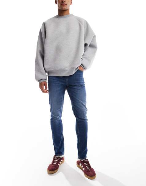 ASOS DESIGN skinny fit jeans in dark wash blue