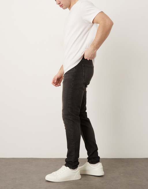 ASOS DESIGN skinny fit jeans in washed black with brown tint, 2 of 5