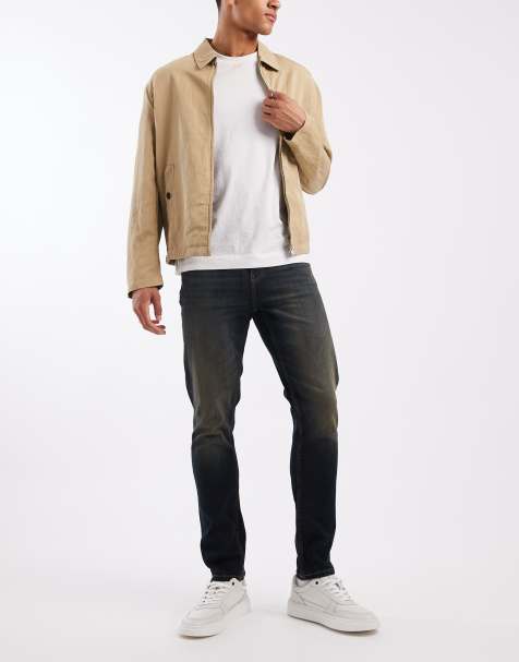 ASOS DESIGN skinny fit jeans with tint in dark wash blue