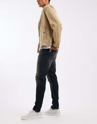 Asos Design Skinny Fit Jeans With Tint In Blue