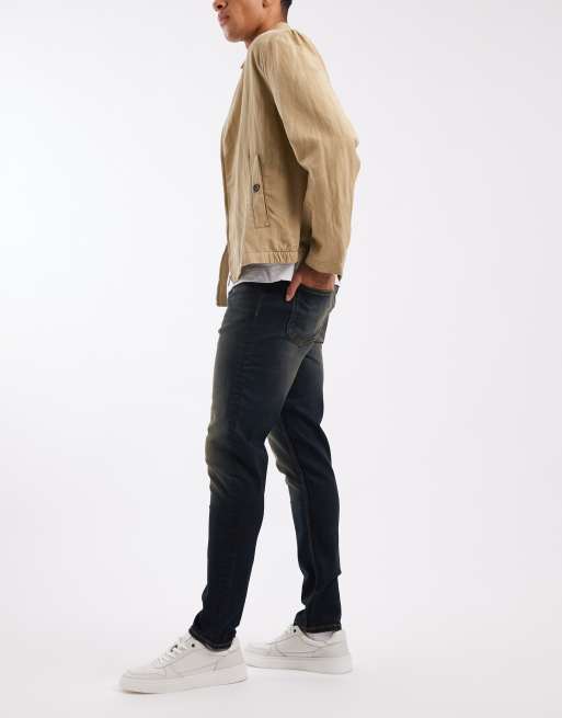 ASOS DESIGN skinny fit jeans with tint in dark wash blue, 2 of 5