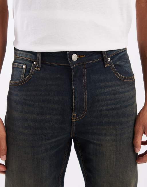 ASOS DESIGN skinny fit jeans with tint in dark wash blue, 4 of 5