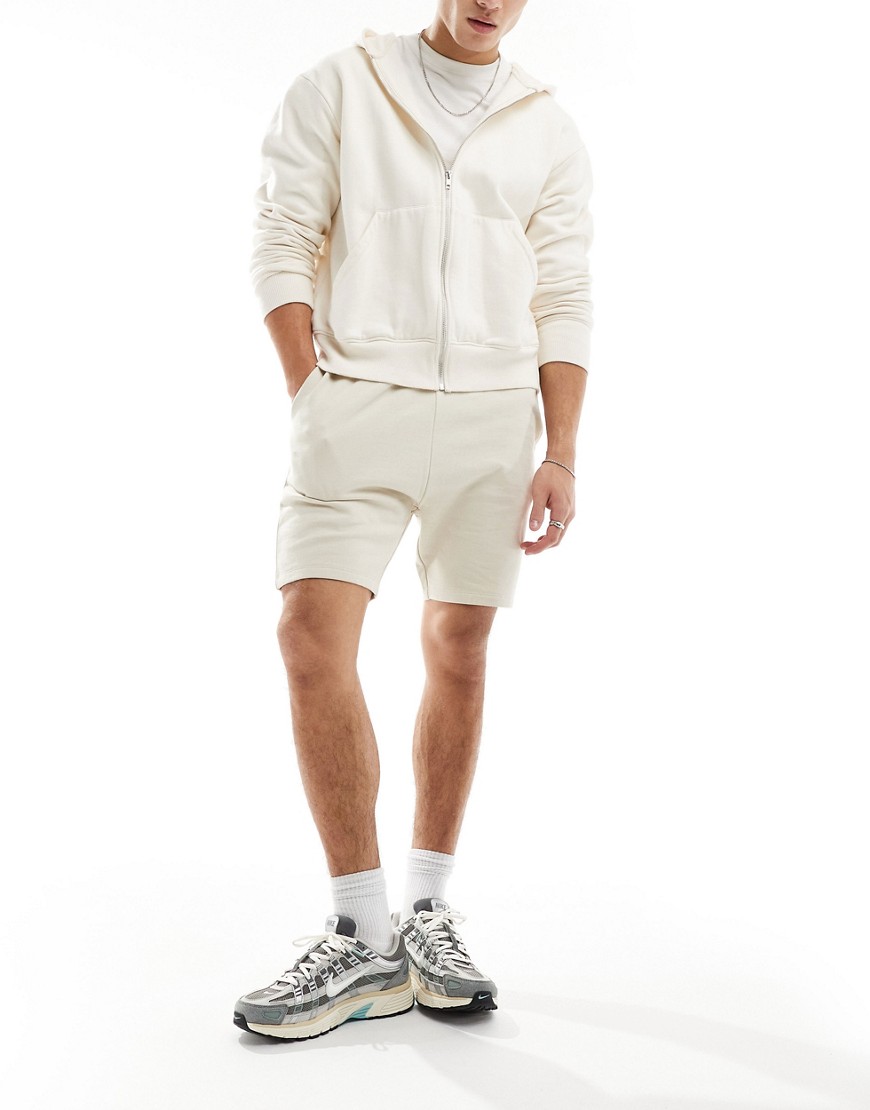 ASOS DESIGN skinny fit shorts in stone-Neutral