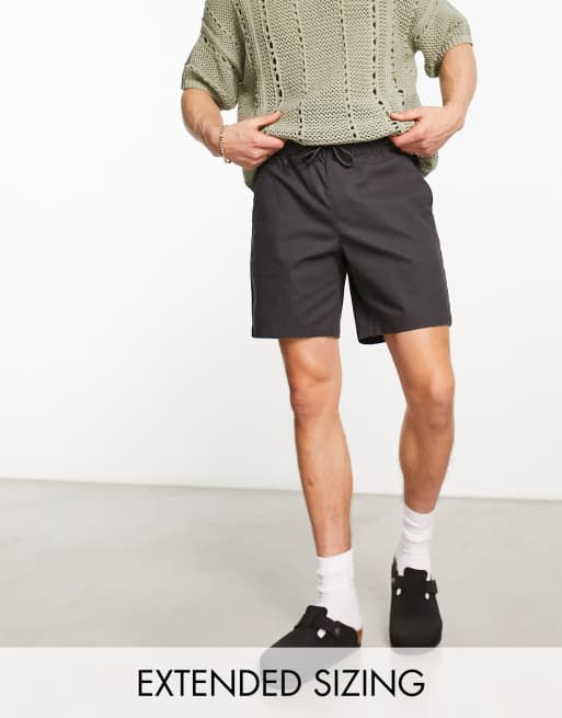 ASOS DESIGN - Skinny, halflange chinoshort in zwart met wassing 
