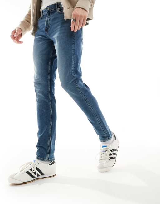 ASOS DESIGN skinny jean in vintage mid tint, 3 of 5