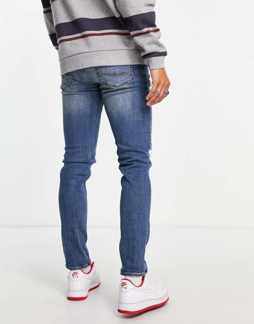ASOS DESIGN - Skinny-jeans i mellemvasket farvet blå med store flænser, 3 af 4
