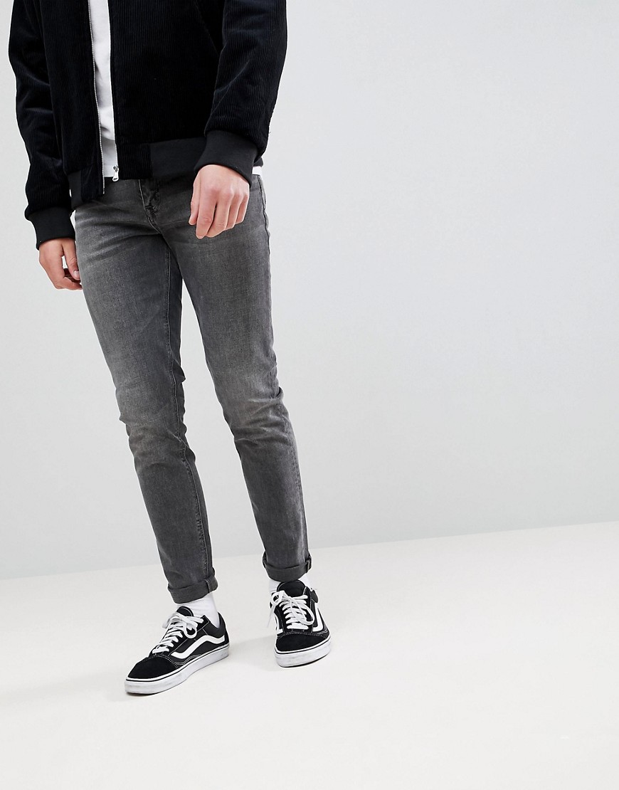 ASOS DESIGN – Skinny jeans i vintagesvart